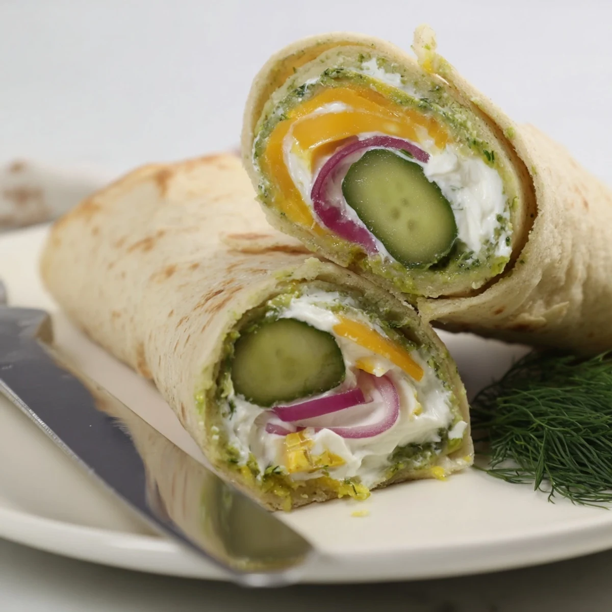 A fun, tangy Pickle-in-a-Blanket, perfect for picnics or party appetizers.