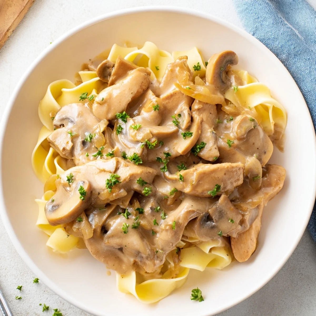 Creamy Chicken Stroganoff, served hot, showcasing tender chicken in a luscious, savory mushroom sauce.