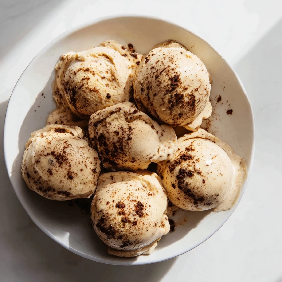Close-up of frozen peanut butter banana ice cream, a delightful, healthy dessert choice.
