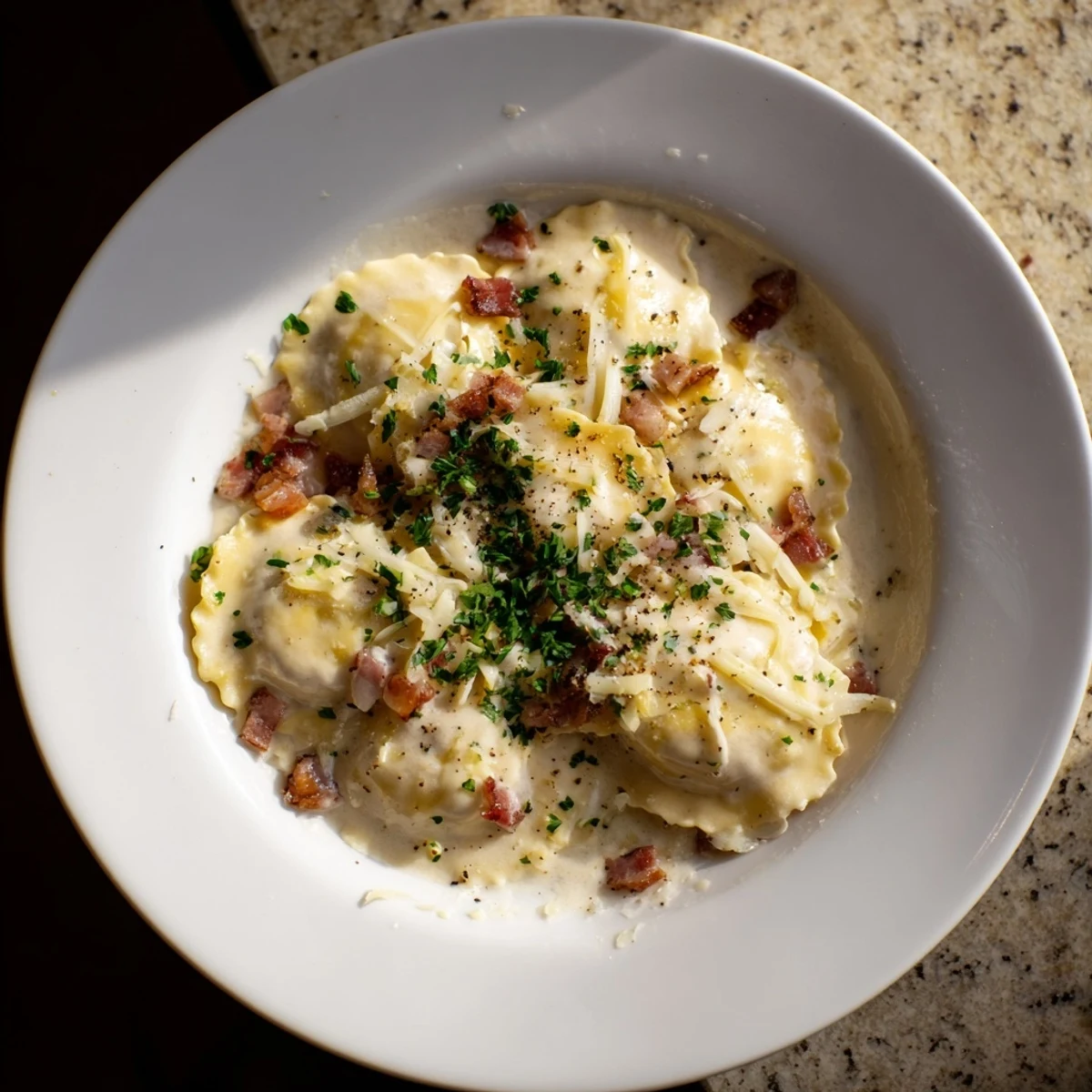 Golden Olive Garden Ravioli Carbonara, saucy and rich, topped with crispy pancetta and fresh parsley.
