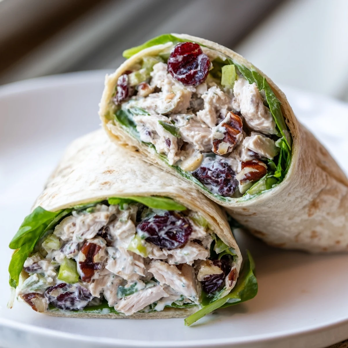 Cranberry Pecan Chicken Salad Christmas Wrap, packed with vibrant colors and creamy textures, ready to eat.