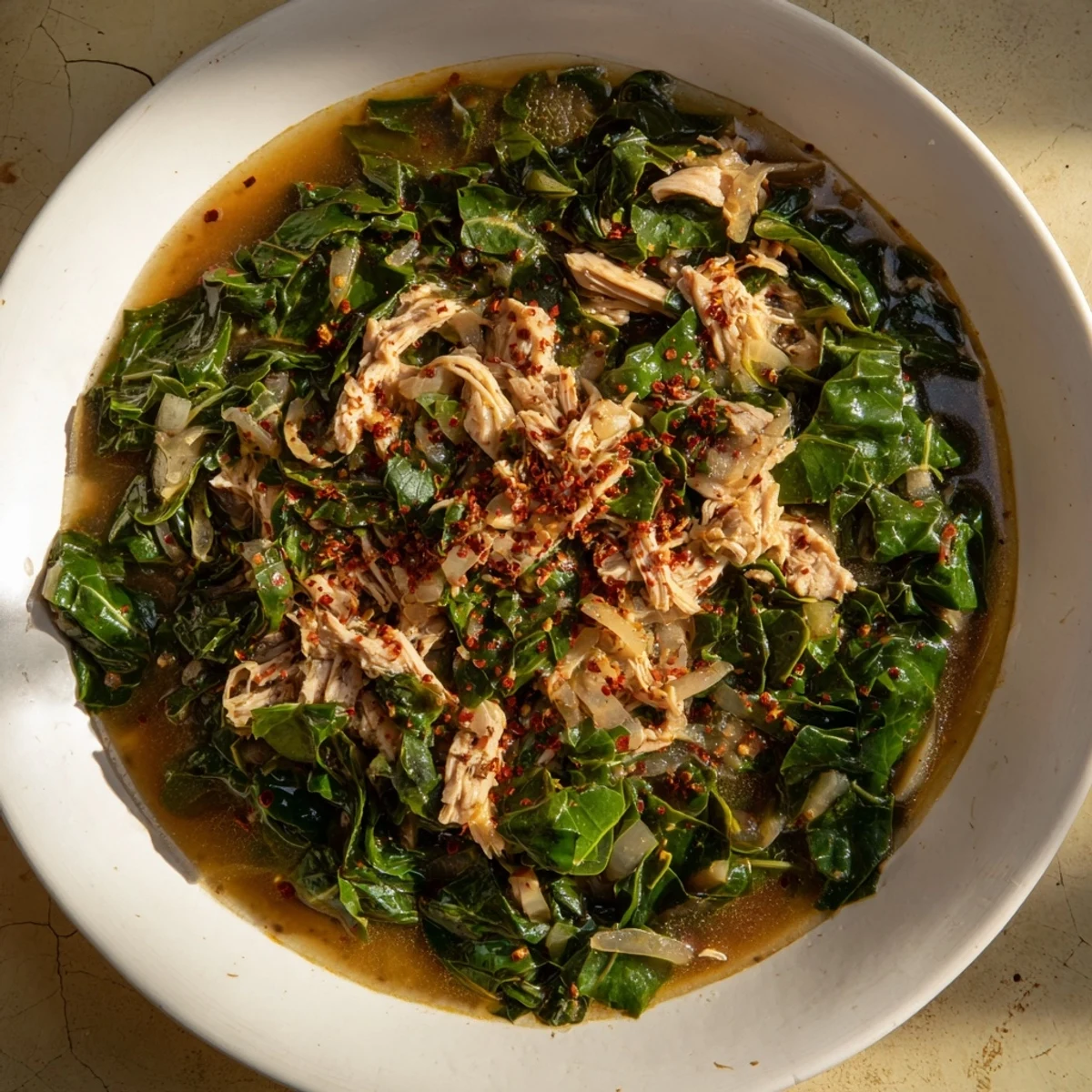 Steaming Southern Style Collard Greens with Smoked Turkey, a savory side dish ready to enjoy.