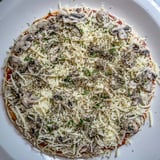 Savory frozen pizza upgrade, featuring melted cheese and mushroom topping, ready to serve and enjoy.