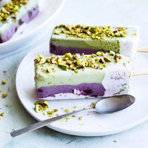 Creamy ube and pistachio ice cream bars drizzled with sweetened condensed milk.  