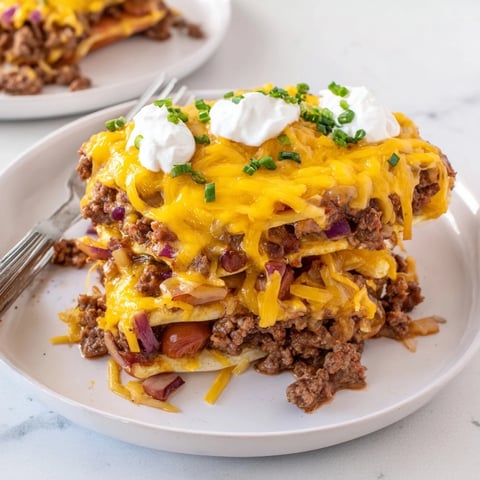 Deliciously cheesy Chili Dog Casserole fresh out of the oven, perfect for gatherings.