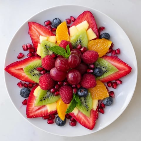 Festive Poinsettia Fruit Bowl: a vibrant, beautiful arrangement of fresh fruits ready for your next brunch!