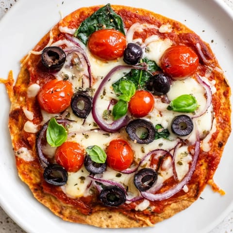 Freshly baked crispy tortilla pizza featuring vibrant toppings and oozing cheese, a quick dinner idea.