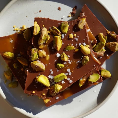 Deliciously rich Pistachio Salted Caramel Bark, studded with pistachios and sea salt flakes.