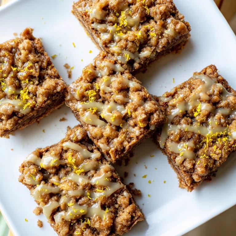 Imagine the warm spices of these Gingerbread Crumble Bars, perfectly balanced by a bright lemon glaze.